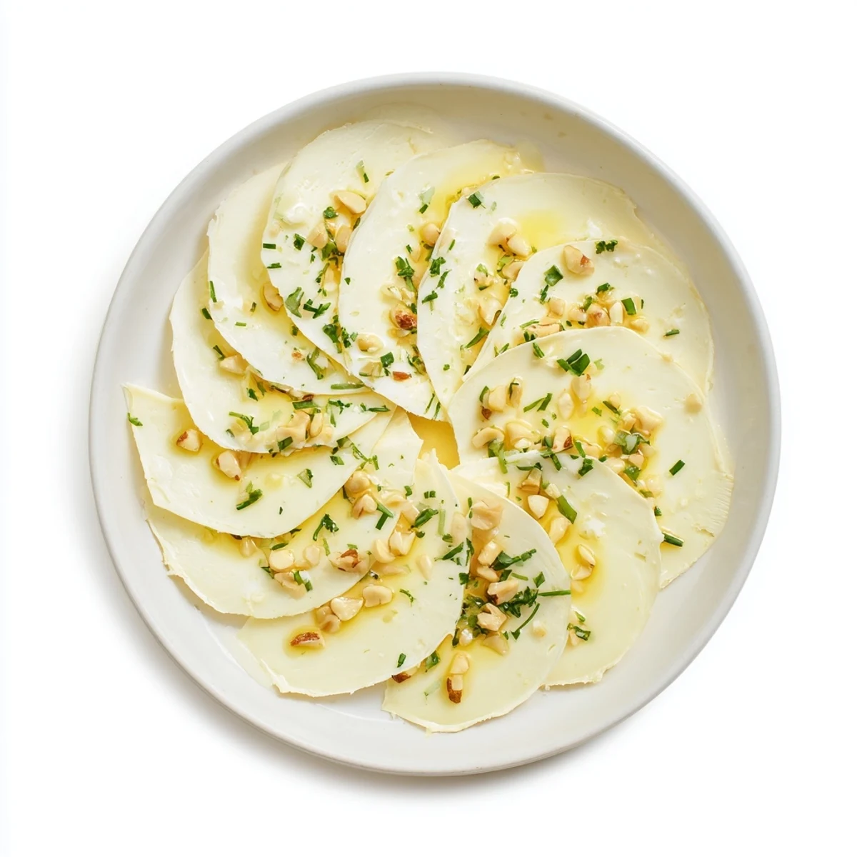 A fan of Swiss cheese slices, delicately arranged and ready for a cheese board.