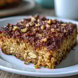 Wholesome spring carrot cake baked oatmeal squares packed with fresh grated carrots and warm spices.  