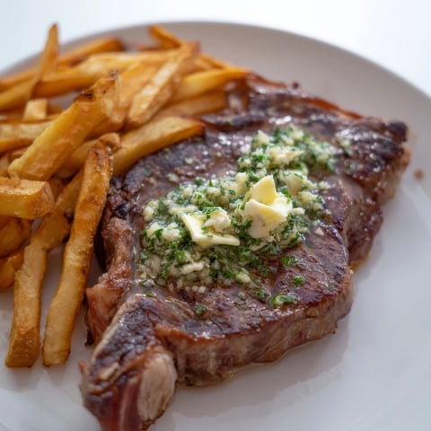 Steakhouse Garlic Butter Steak & Fries served with golden, crispy fries and melted herb butter.