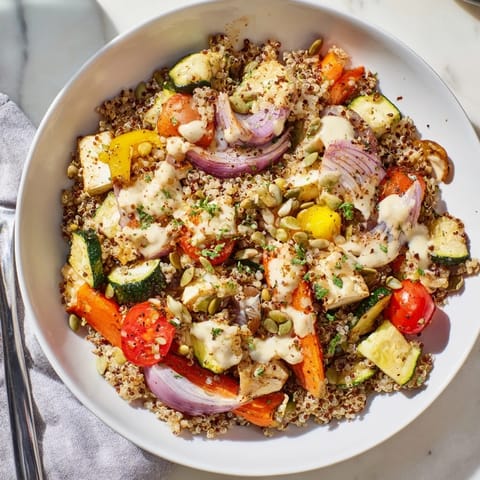 Delicious quinoa and roasted vegetable bowl, perfect for meal prep and plant-based eating.  