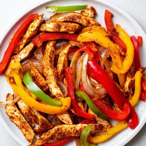 Golden, roasted sheet-pan chicken fajitas: a flavorful, weeknight Tex-Mex dinner idea.