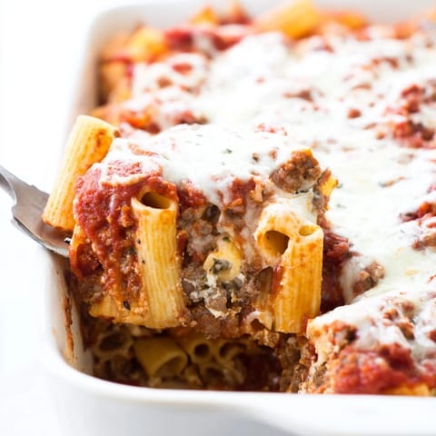 Golden-brown Freezer Make-Ahead Baked Ziti fresh from the oven, bubbling with melted mozzarella and rich tomato sauce.  