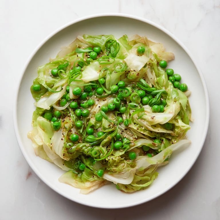 Delicious and easy, this Cabbage Stir-Fry showcases perfectly cooked vegetables in a soy-garlic glaze.